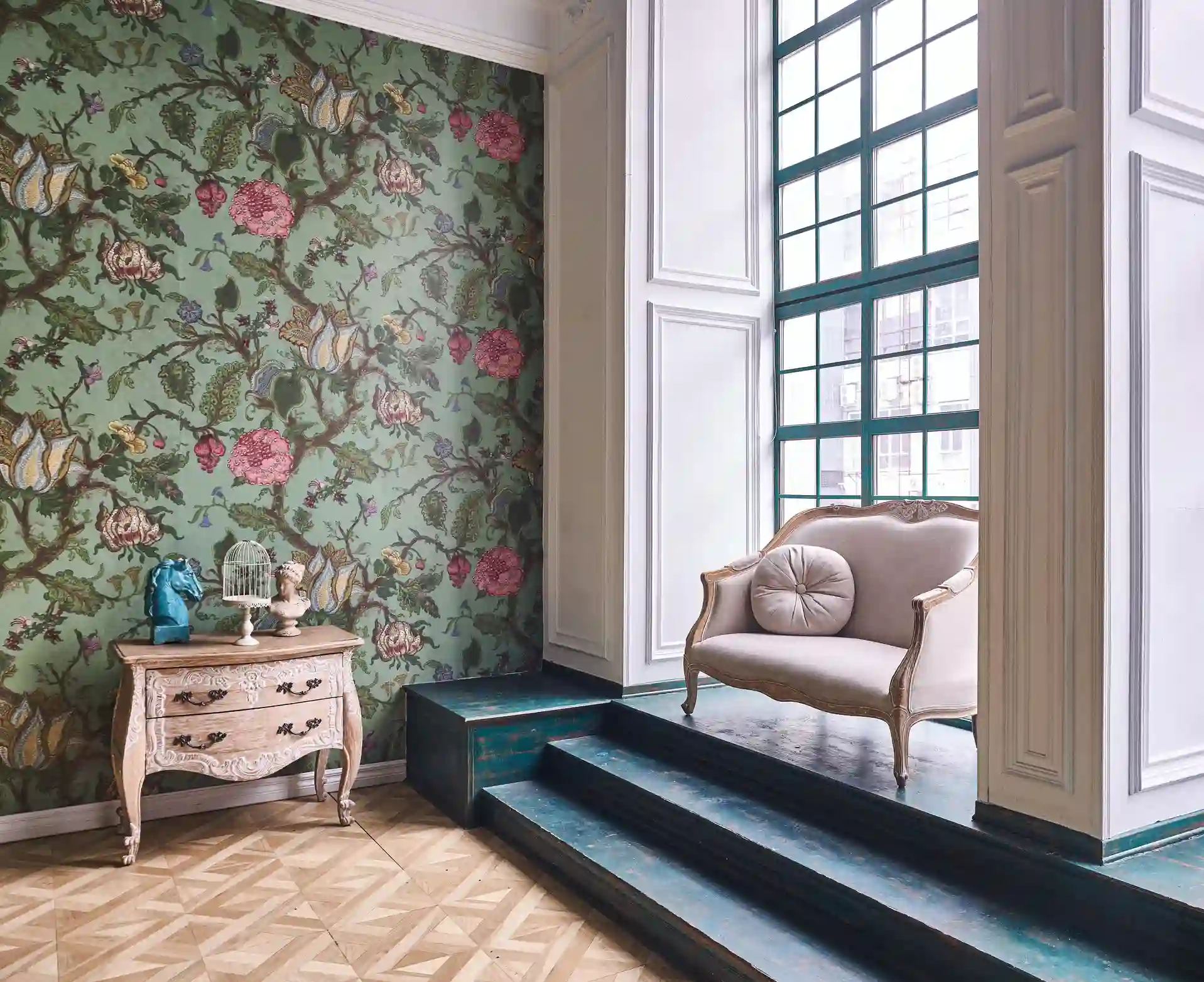 A soft floral-patterned wallcovering in a bright sitting area